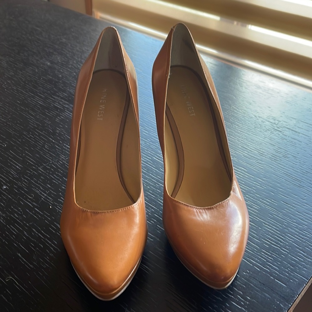 Nine West tan pumps. Only wore once.